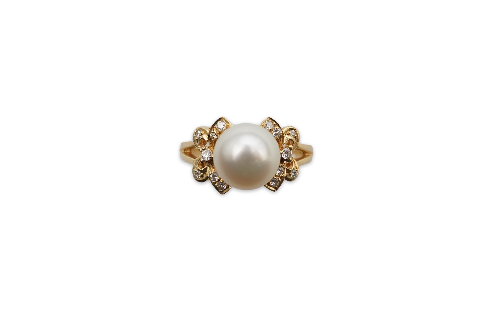 A cultured pearl and diamond ring
